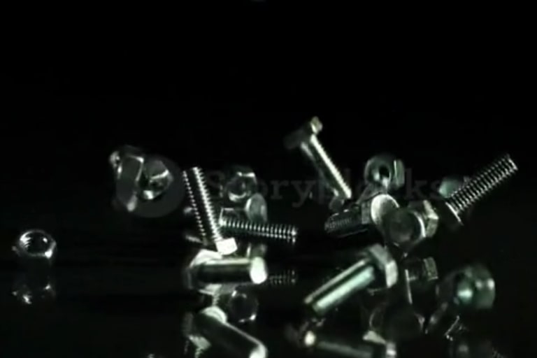 Numerous screws falling